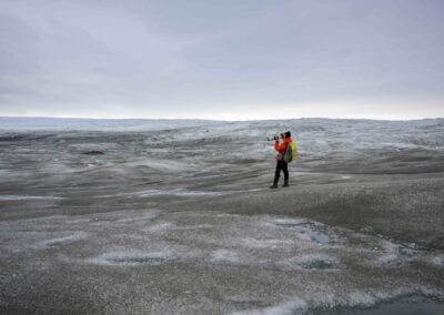Guest taking photos on the glacier
